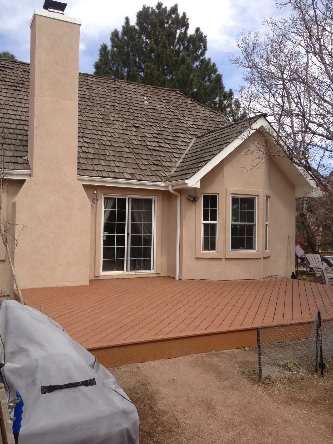 Stained and painted redwood deck in the Front Range