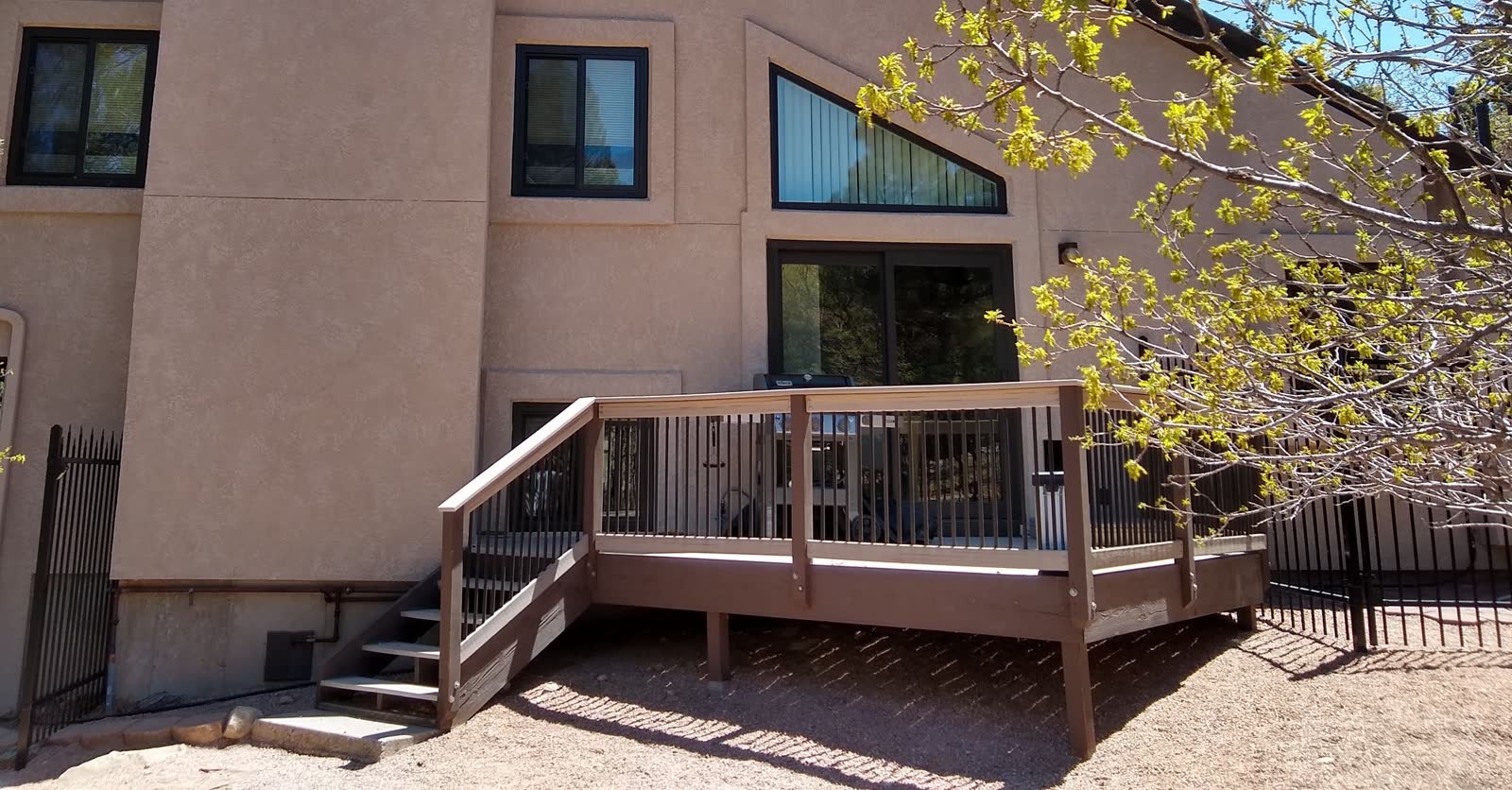 Restored Colorado mountain deck with new stain