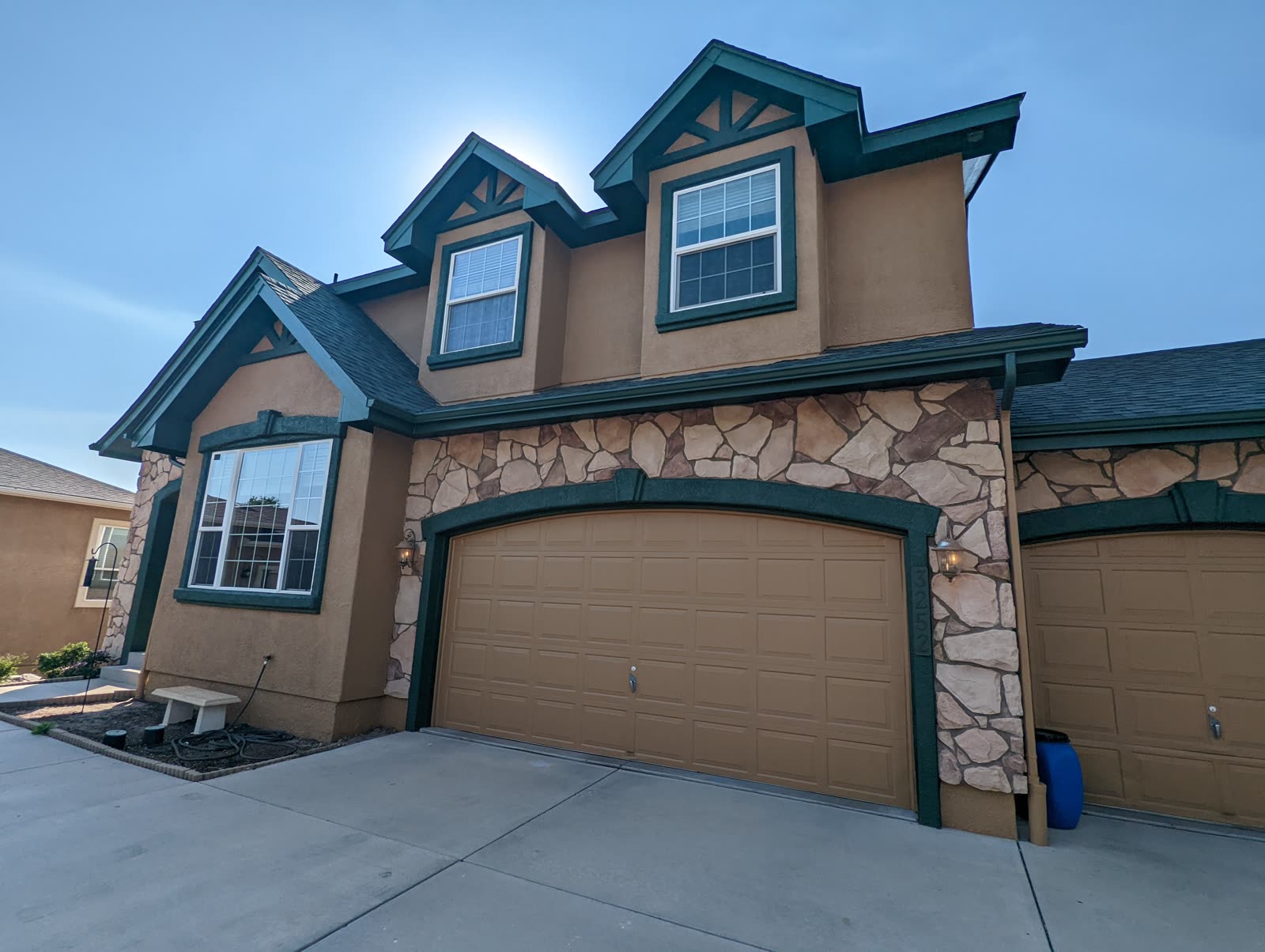 Exterior house painting on a Colorado Springs craftsman home